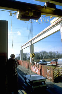 A die being lifted by a hoist